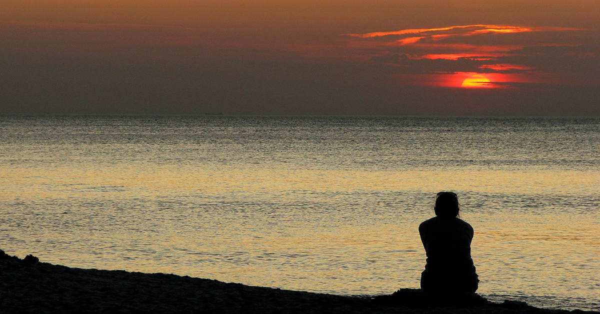 woman staring at the sea