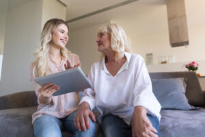 elderly woman with child discussing downsizing